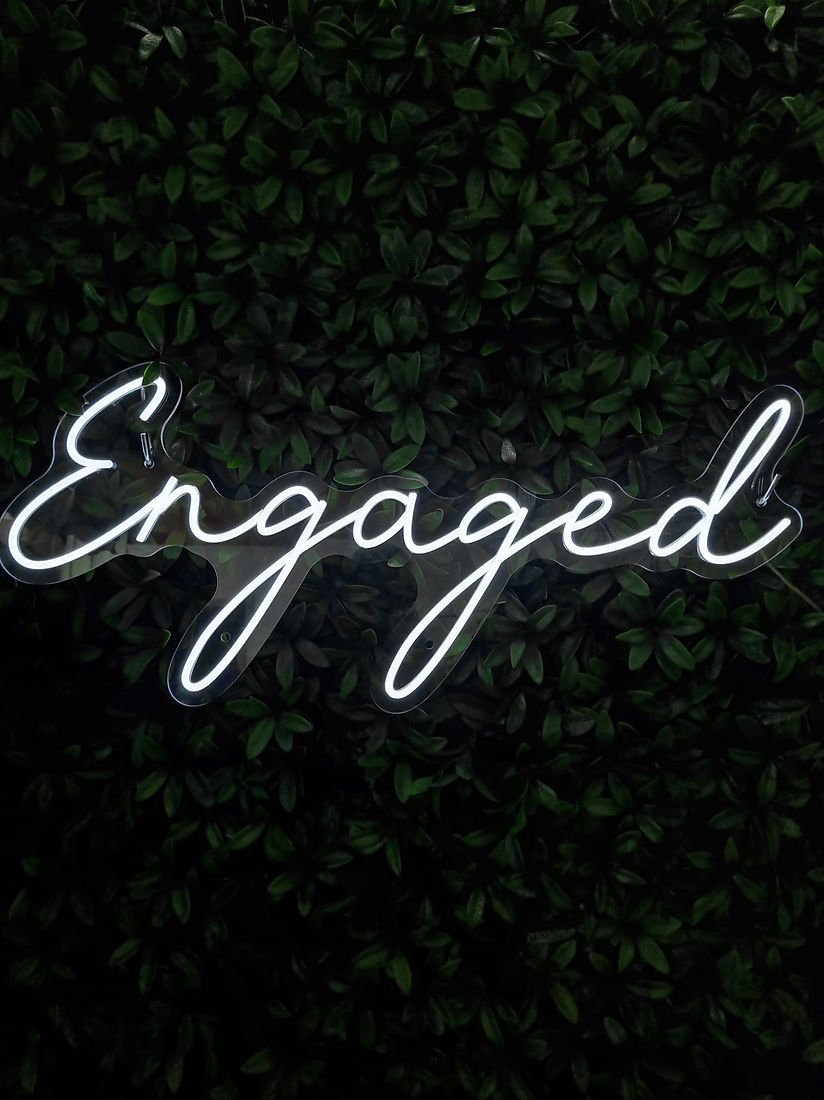 9920e0_c6342771c2014e27aa22081caff1222dmv2.jpg Engaged Neon Sign - Image 1