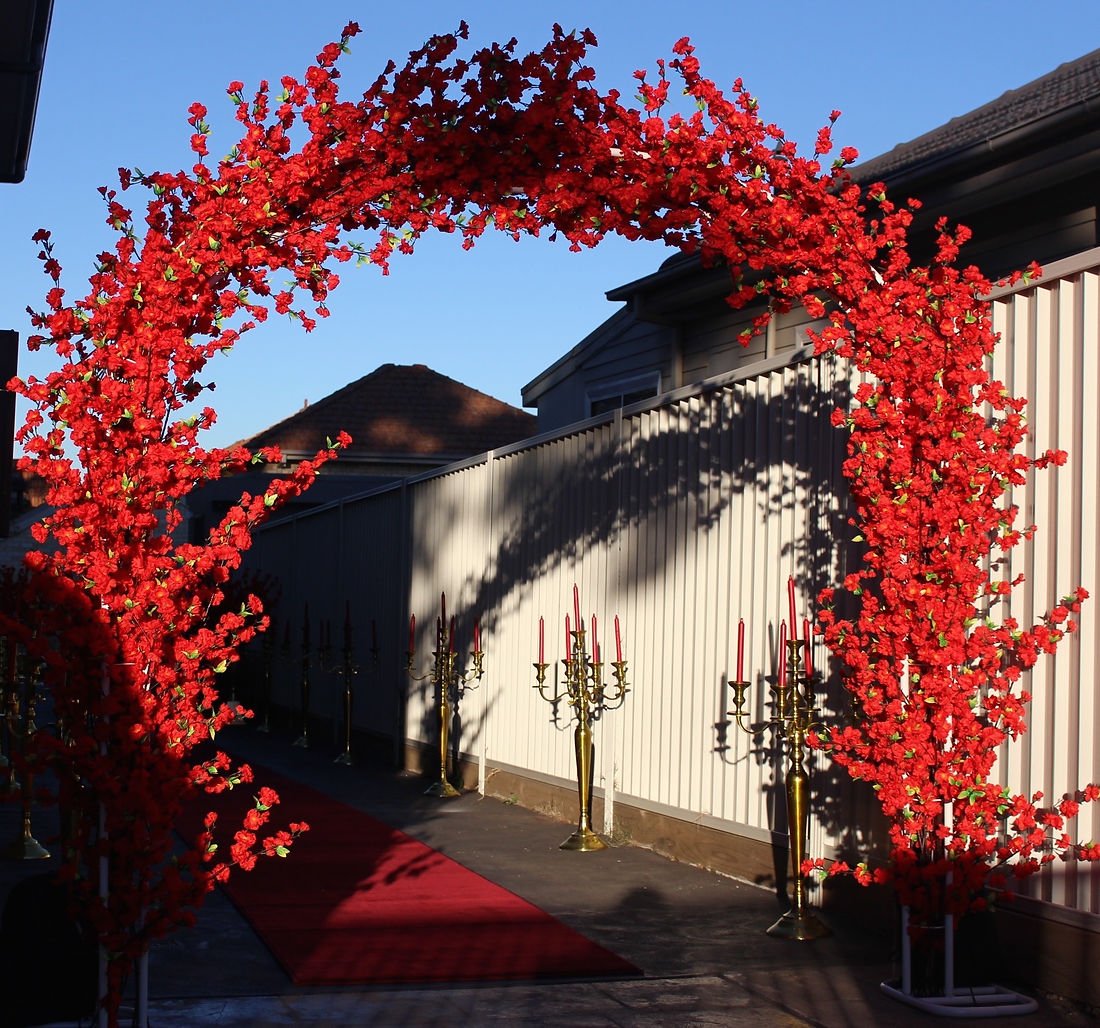 bead3e_e2564b3a03d947f09889326e9a2eb8c0mv2_d_1848_1728_s_2.jpg Red Cherry Blossom Arch - Image 1